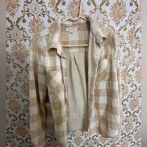 Large shacket in shade cream.